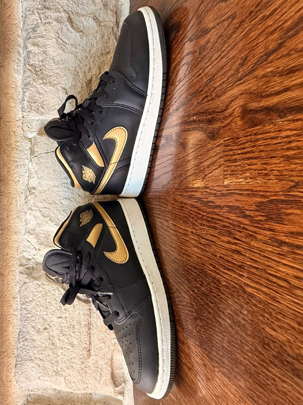 Nike Air Jordan 1 mid Sneakers in Black and Gold